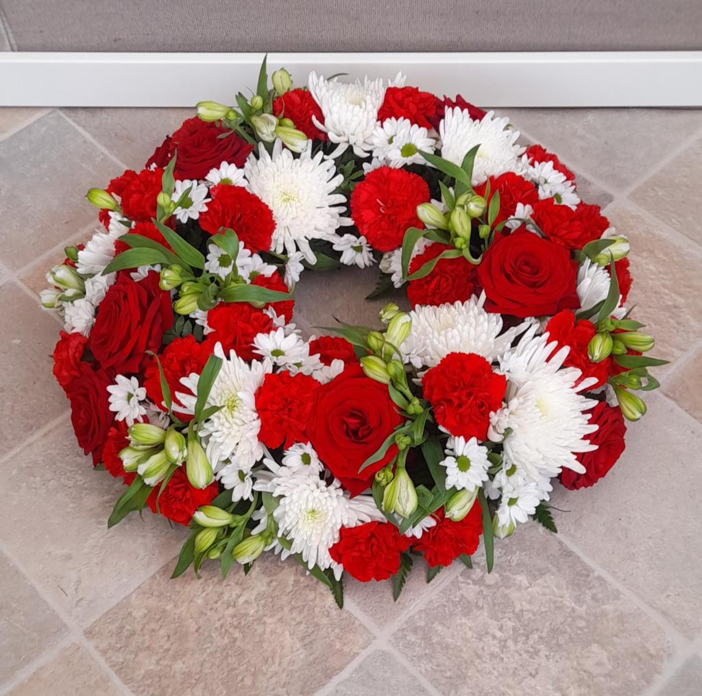 Krans rundpynt. Blomsterpigens farvevalg